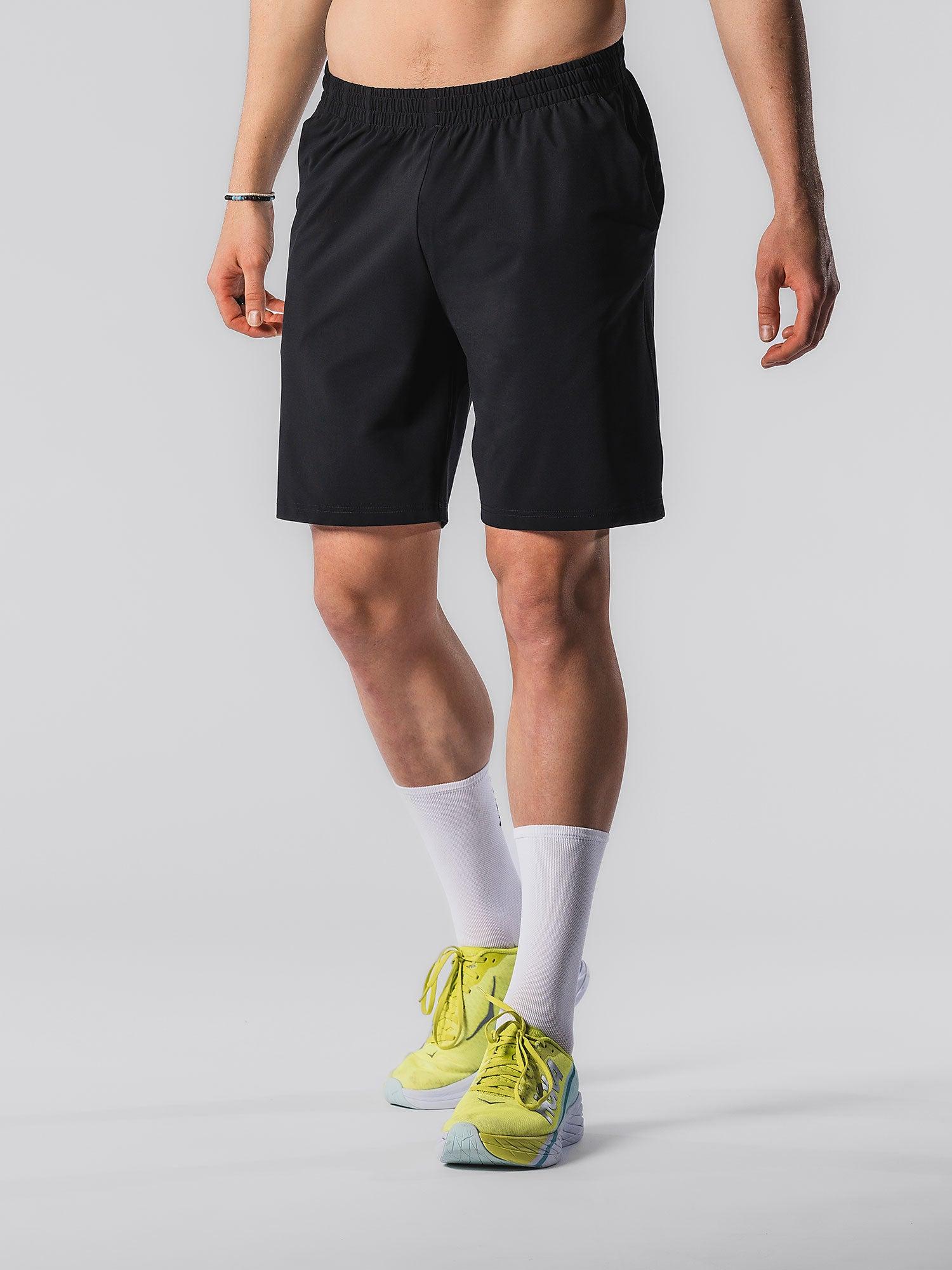 Fusion TEMPO! TWO Shorts — sort lang løbeshorts med lommer, unisex