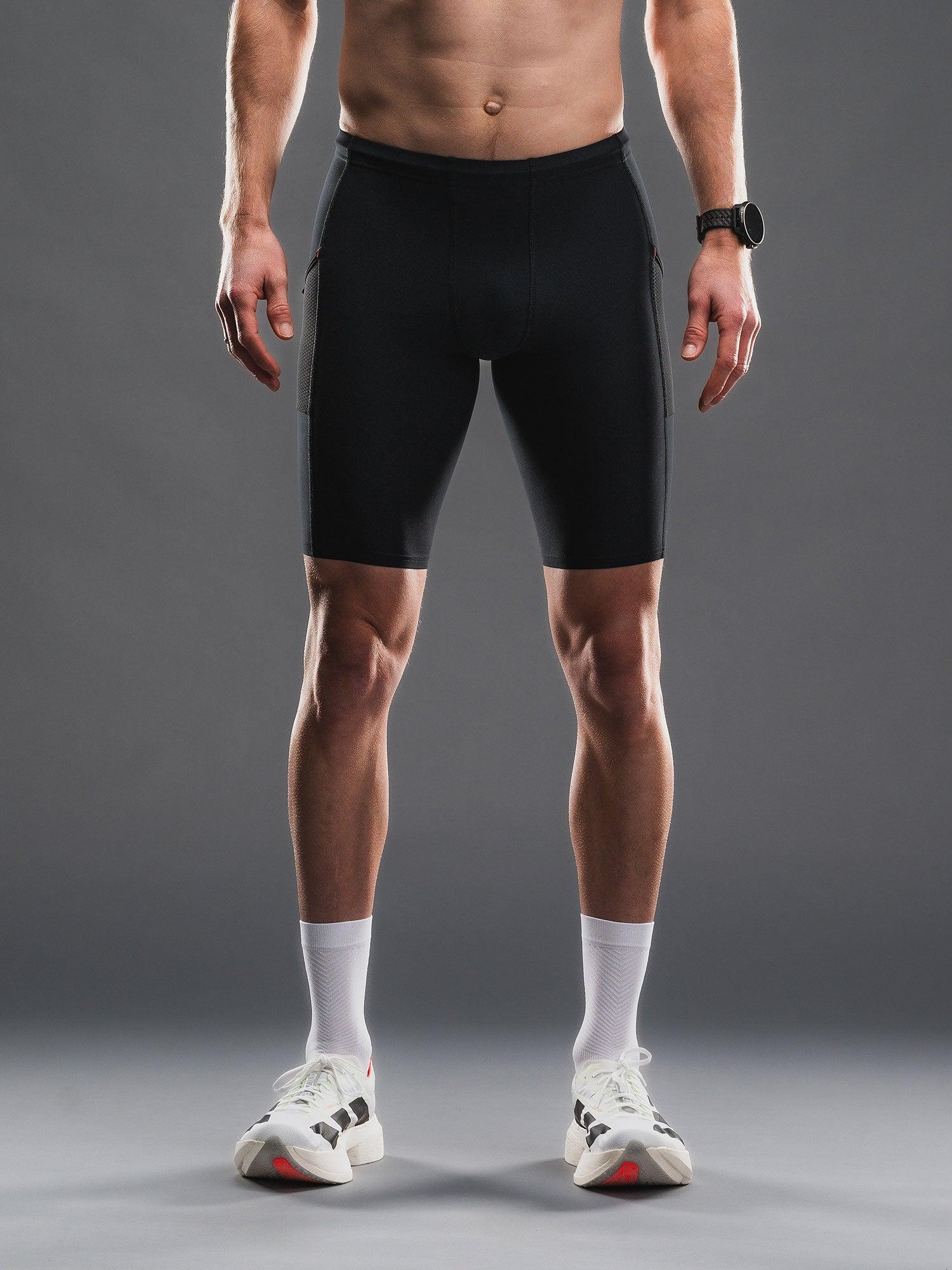 Fusion TEMPO! Run Tights i sort — løbetights til lange distancer og konkurrence